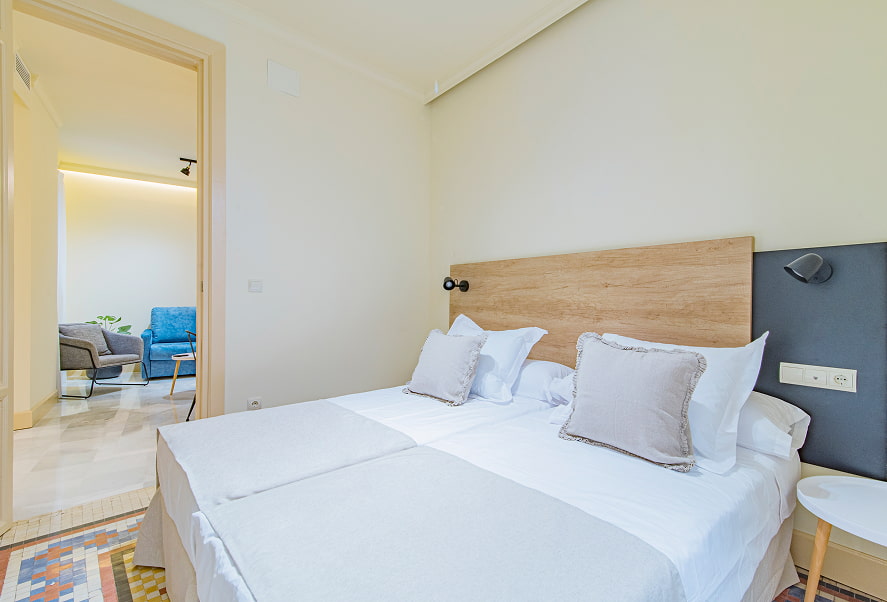 Habitación con dos camas individuales unidas